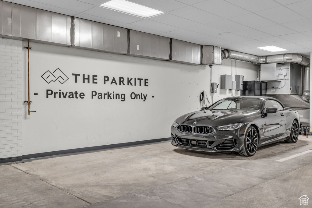 Parking garage featuring baseboards