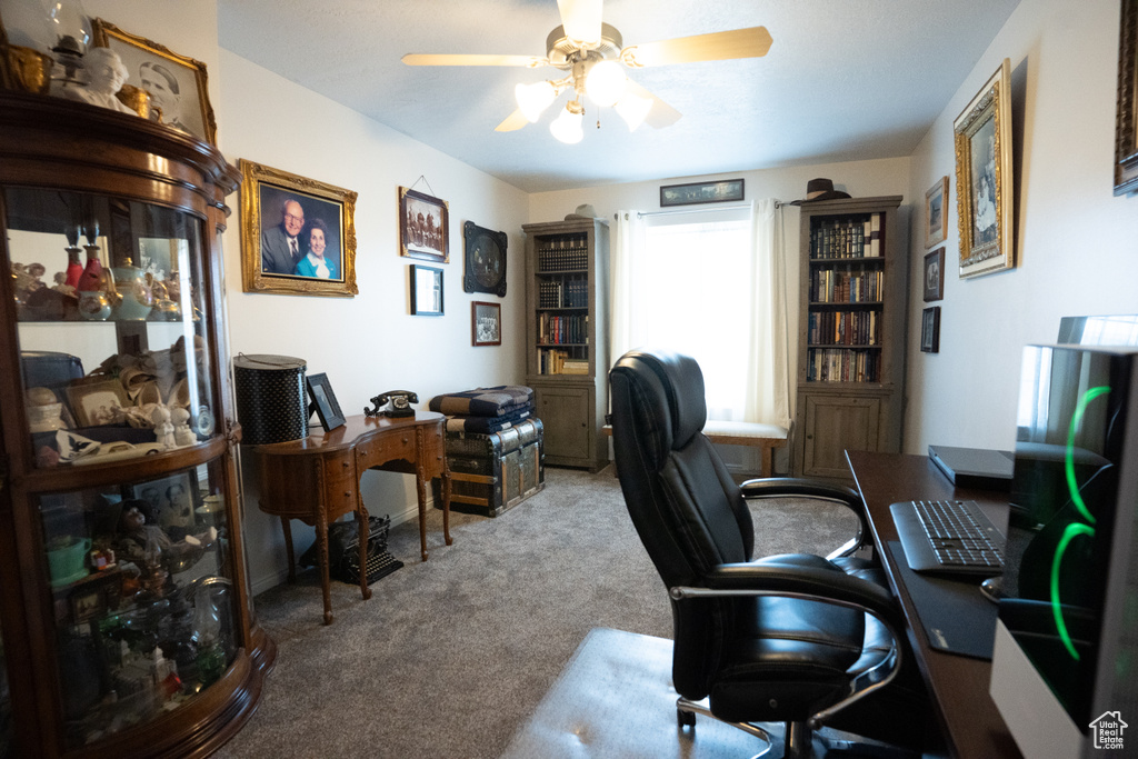 Office featuring carpet floors and ceiling fan