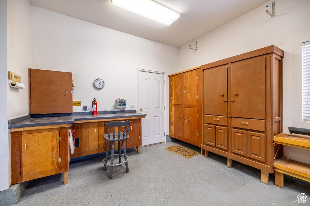 Miscellaneous room featuring concrete floors
