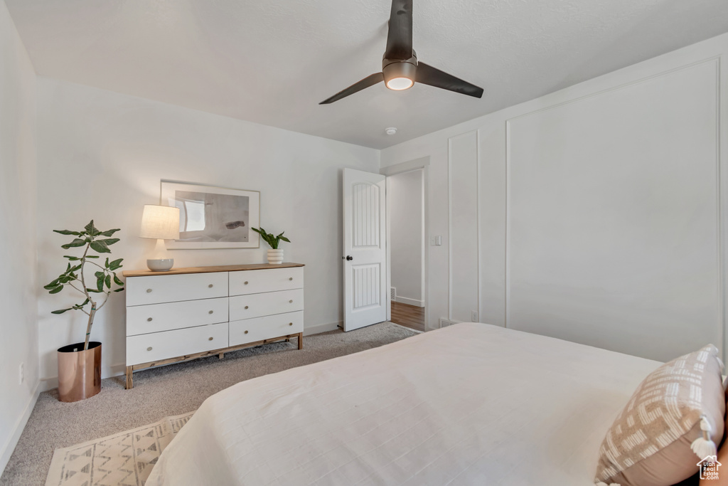 Bedroom featuring carpet flooring and a ceiling fan