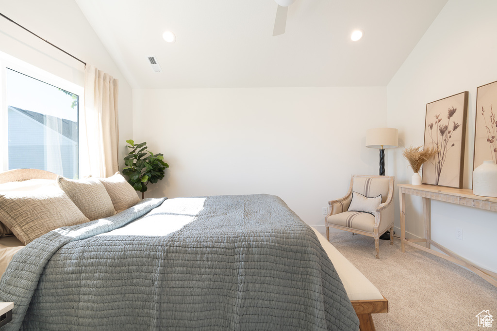 Bedroom featuring vaulted ceiling, light colored carpet, recessed lighting, and a ceiling fan