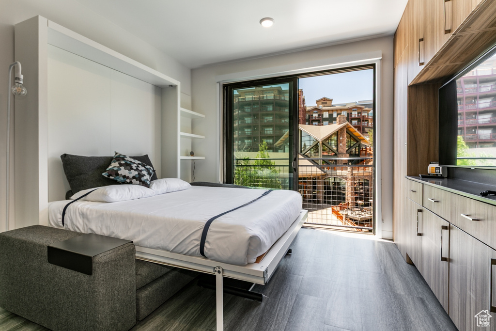 Bedroom featuring dark wood finished floors