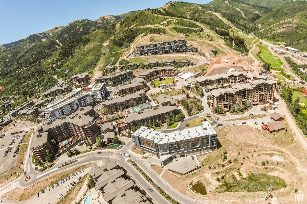 Aerial view of property\'s location featuring mountains