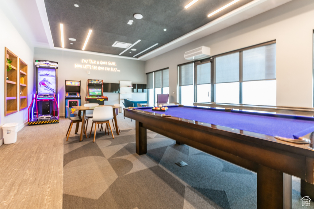 Game room featuring a wall unit AC and billiards table