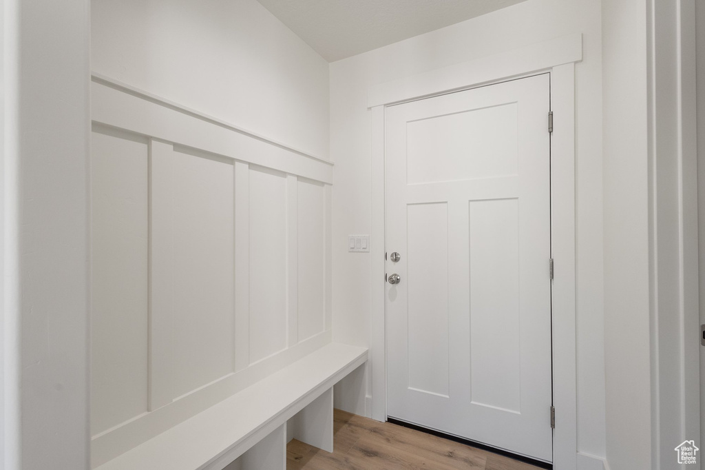 Mudroom with light wood-style flooring