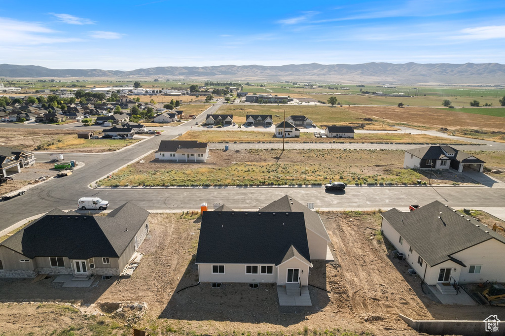 Aerial view of residential area with a mountainous background