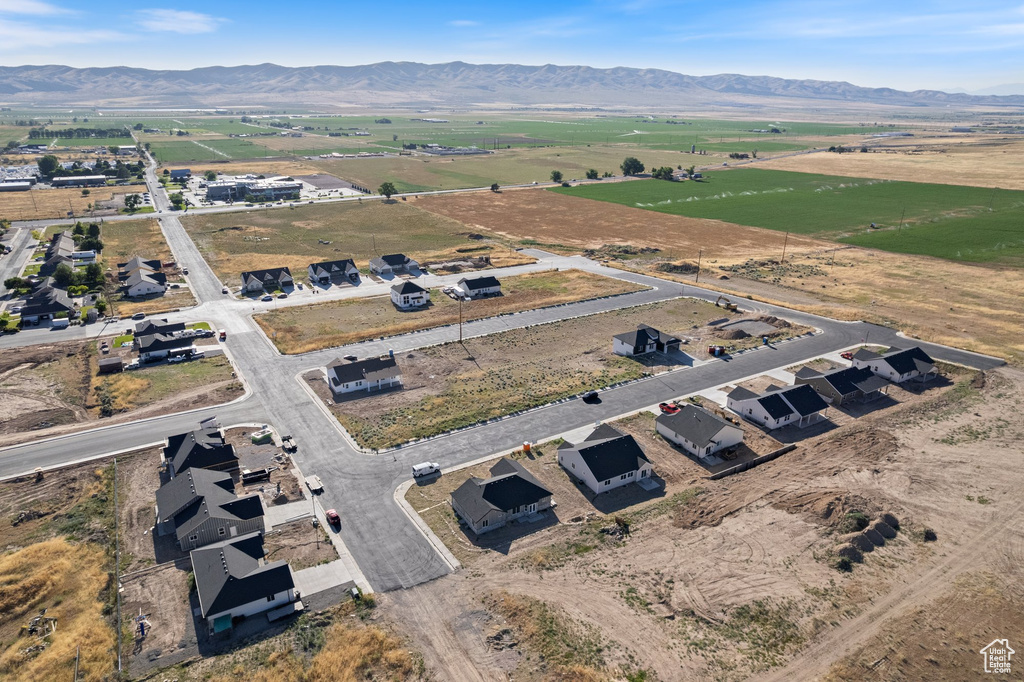 Aerial view of sparsely populated area with mountains