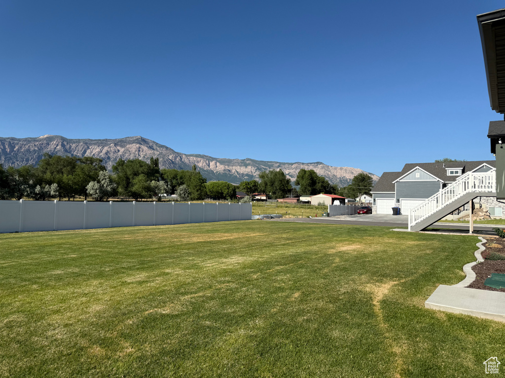 View of yard with a mountain view