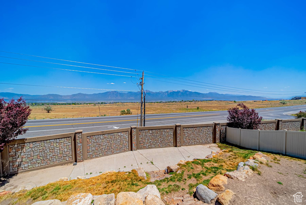 View of yard with a mountain view