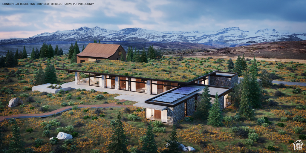 View of subject property featuring a mountain backdrop