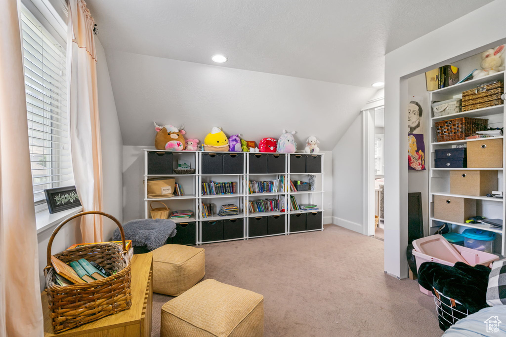 Game room featuring vaulted ceiling, carpet floors, and recessed lighting