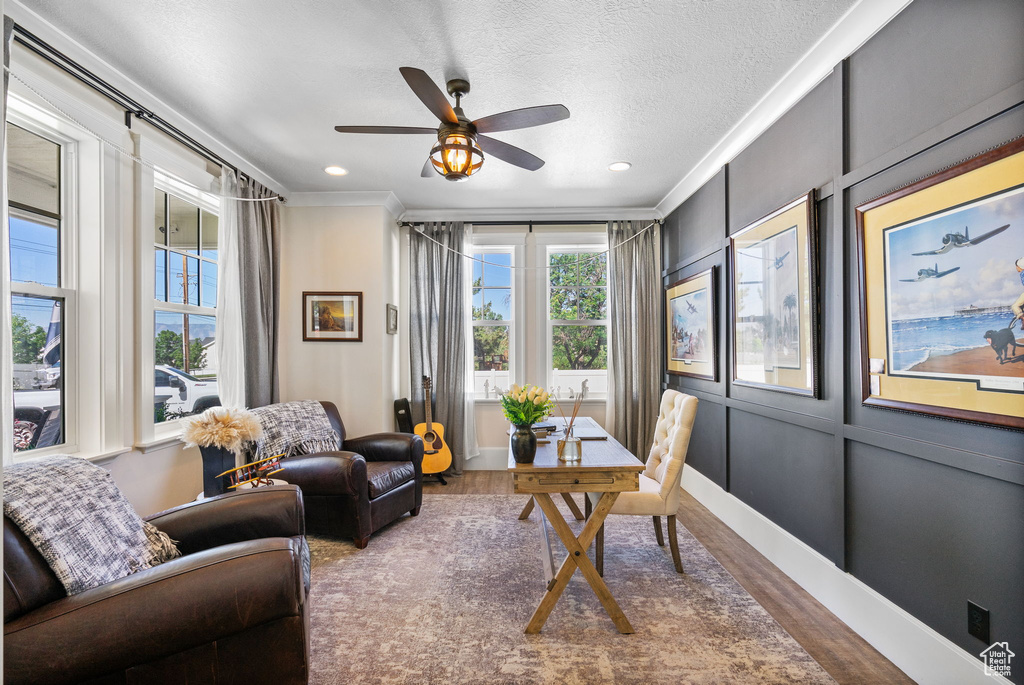 Office with ornamental molding, wood finished floors, a ceiling fan, recessed lighting, and a textured ceiling