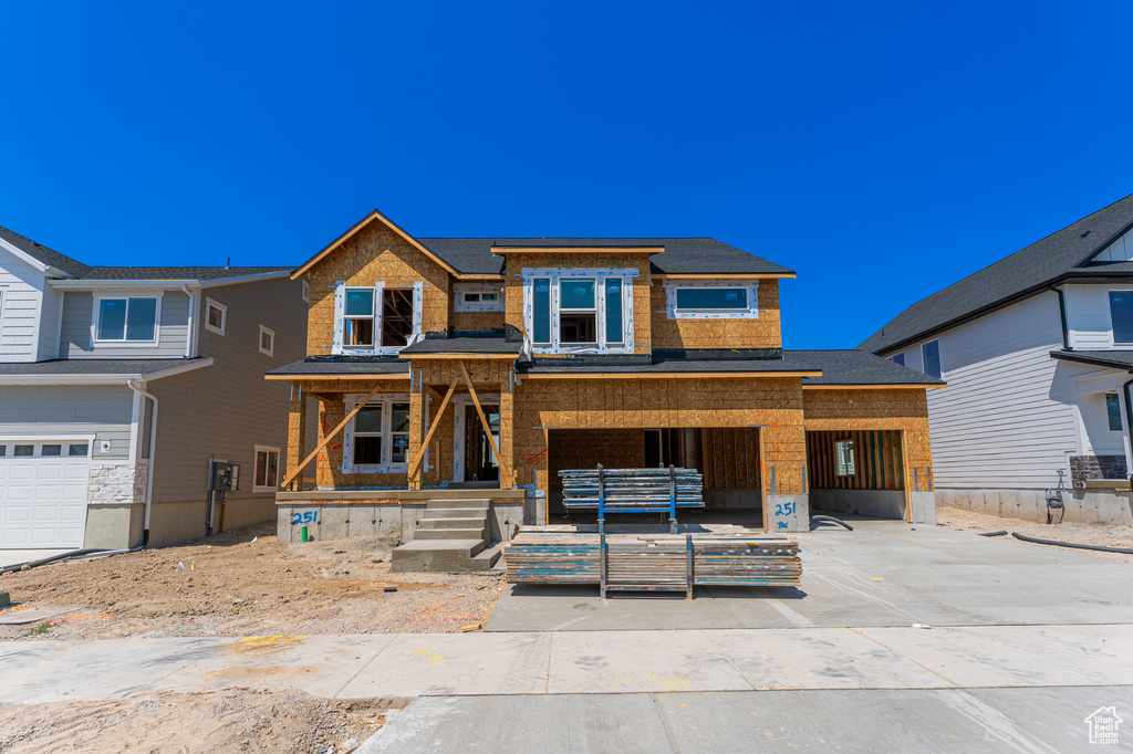 View of front of property with covered porch