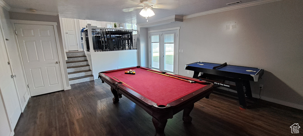 Rec room featuring wood finished floors, ornamental molding, billiards table, and a ceiling fan