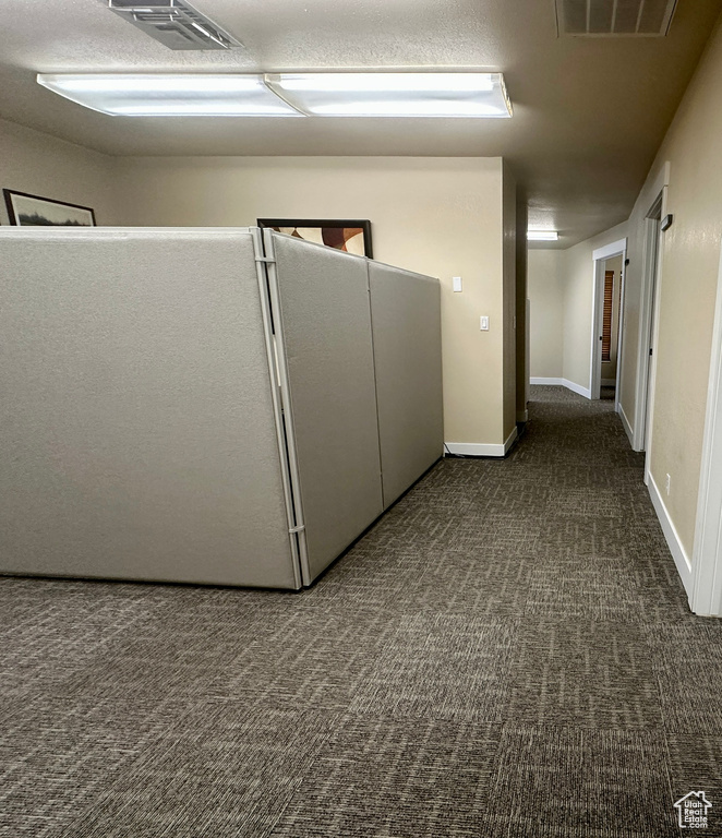Corridor with carpet floors
