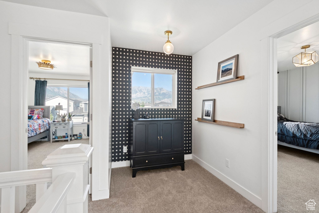Bedroom / living area view of carpet floors and baseboards