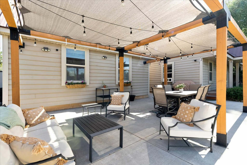 View of patio / terrace featuring an outdoor hangout area and outdoor dining space