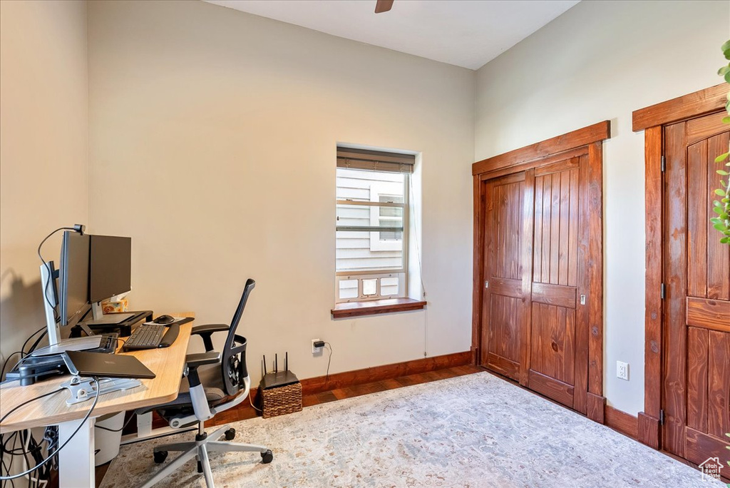Office featuring wood finished floors and ceiling fan