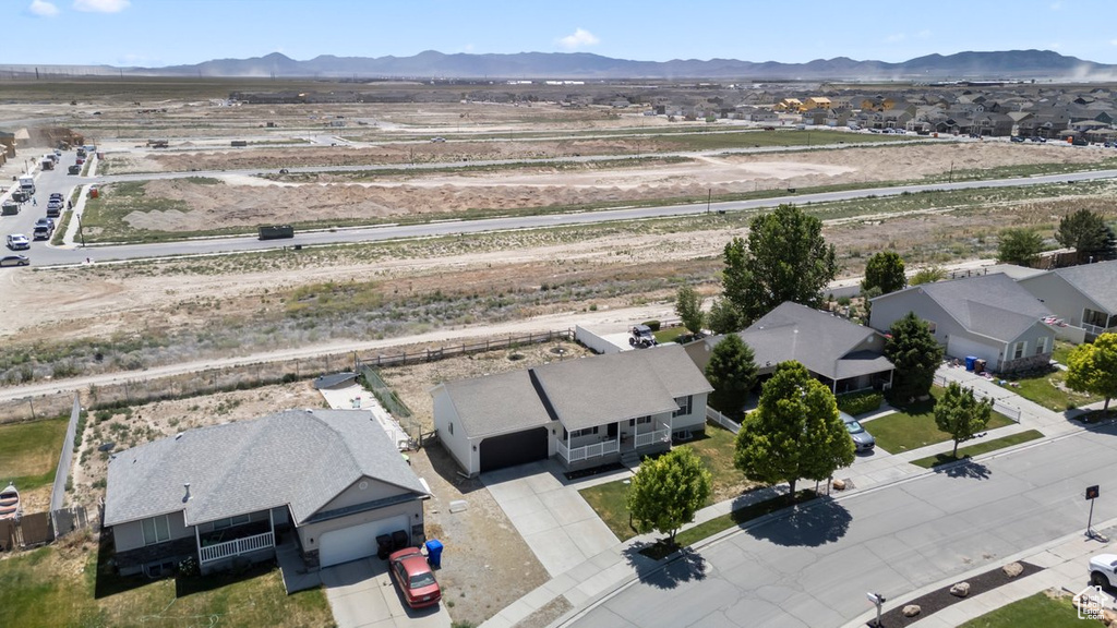 Aerial view of residential area with mountains