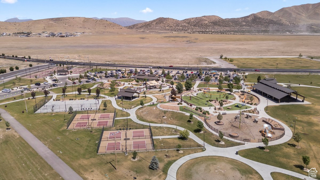 Aerial view of property's location with a mountain backdrop