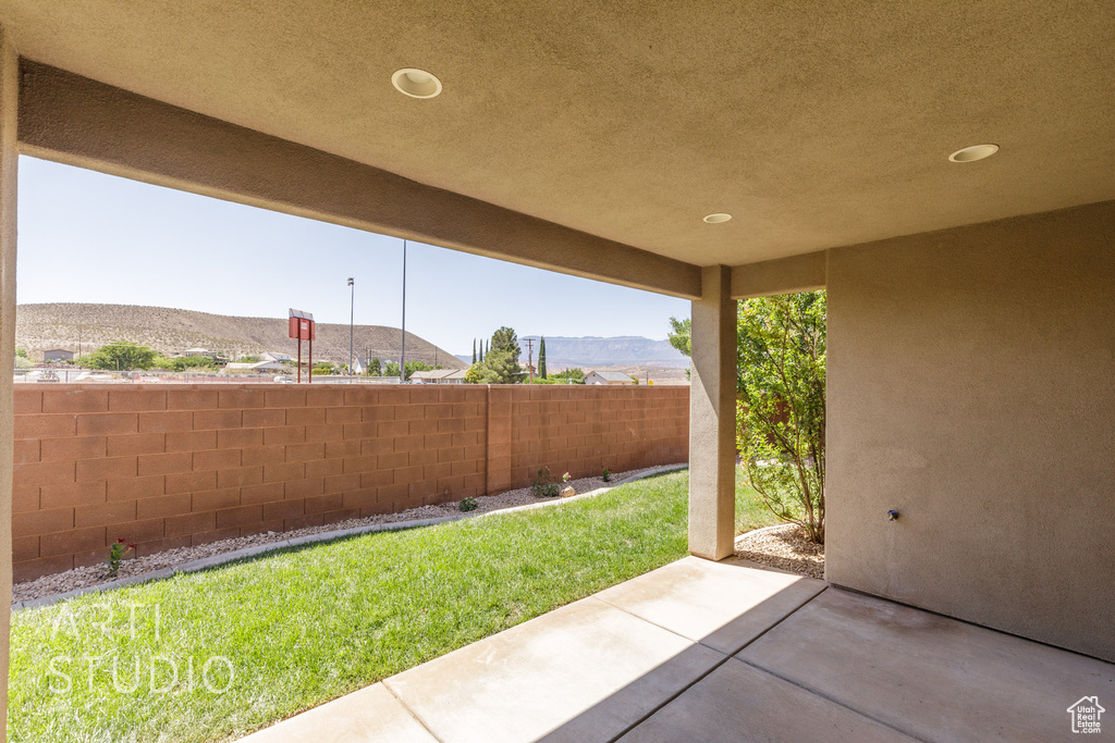 View of patio / terrace featuring a mountain view