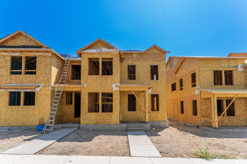 View of front of house featuring stucco siding