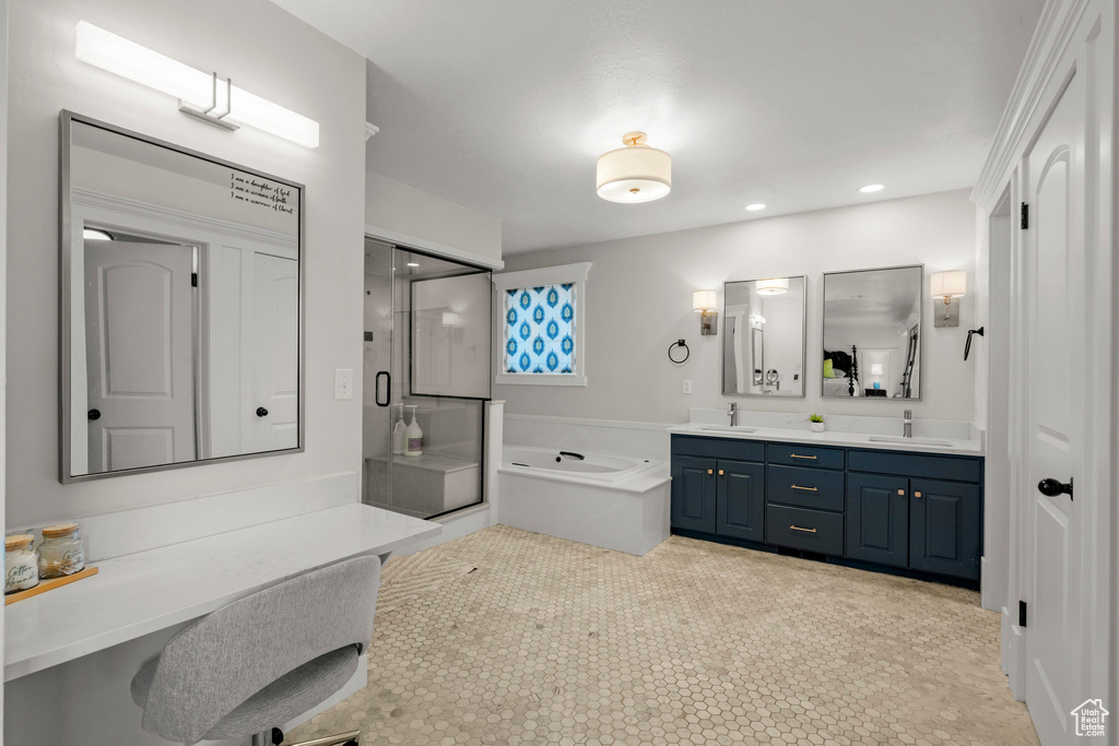 Full bath with a bath, double vanity, a stall shower, and recessed lighting