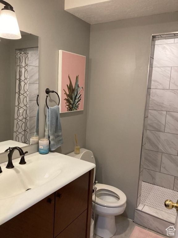 Bathroom featuring vanity and a shower with curtain