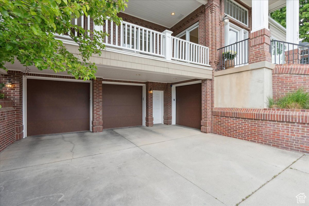 Garage with concrete driveway