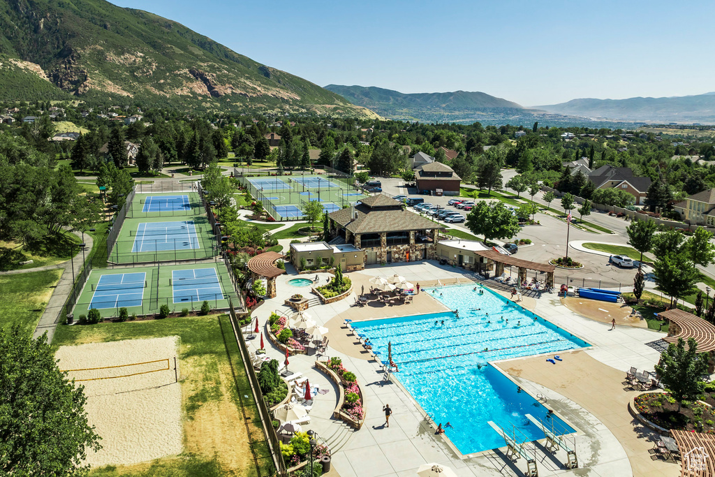 View of pool with a mountain view
