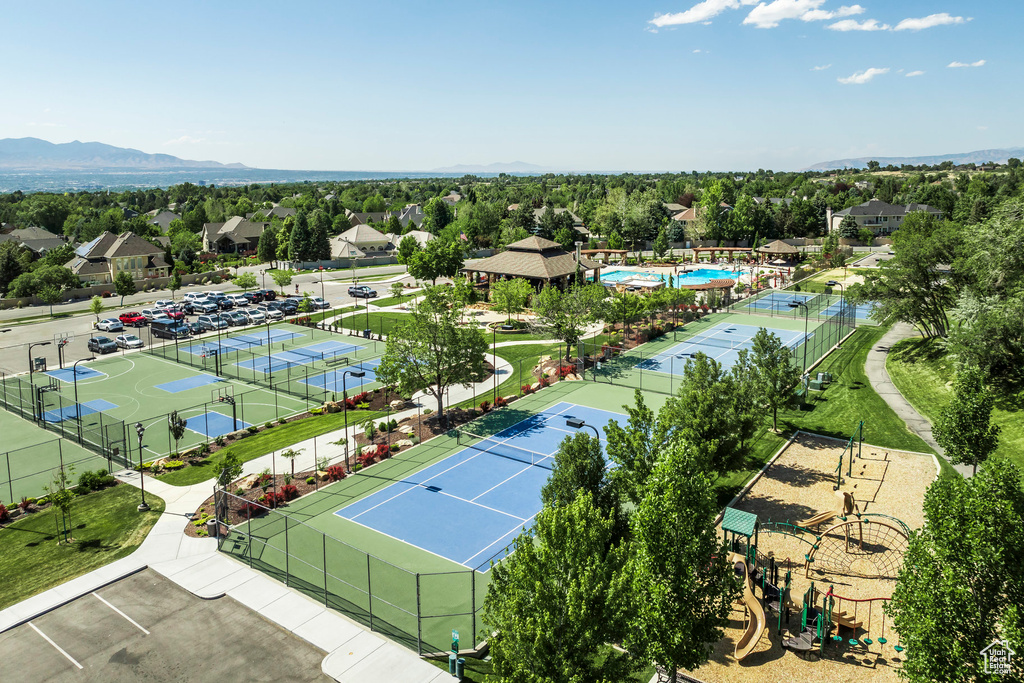 Bird's eye view of mountains and a pool area