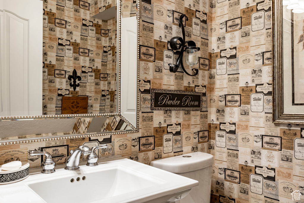 Bathroom with toilet and a sink