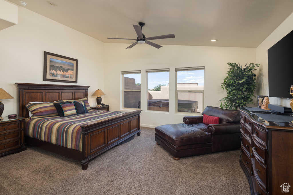 Carpeted bedroom with recessed lighting and ceiling fan