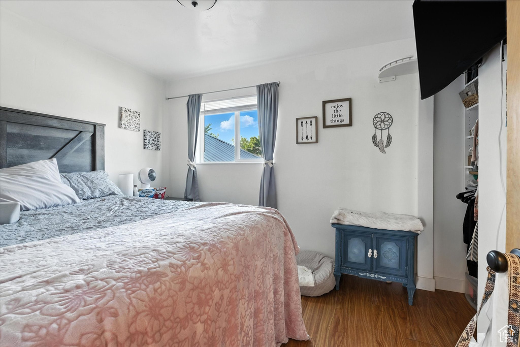 Bedroom featuring wood finished floors