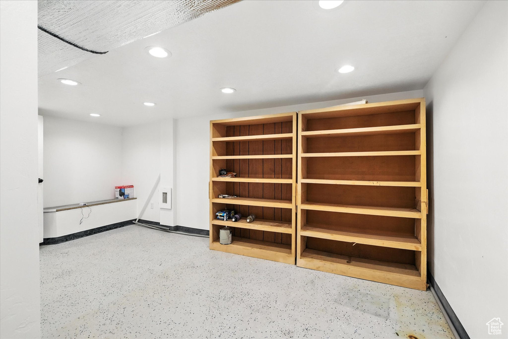 Basement featuring recessed lighting