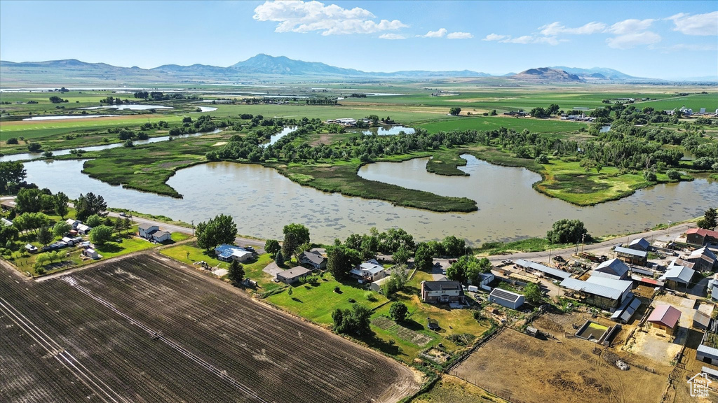 Aerial view of property\'s location featuring a water and mountain view