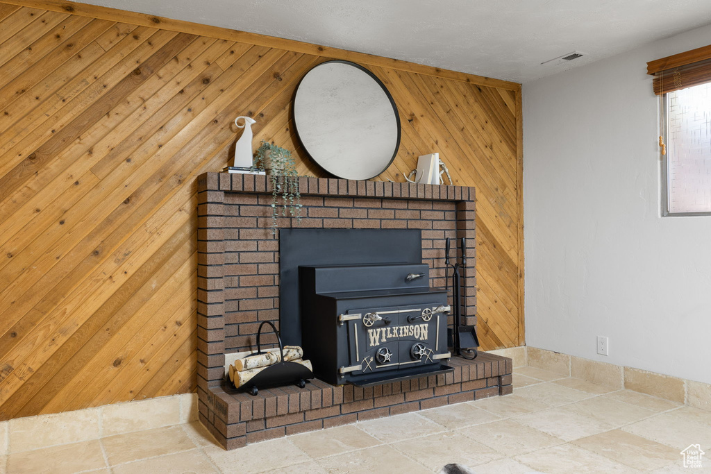 Detailed view of a wood stove and wood walls