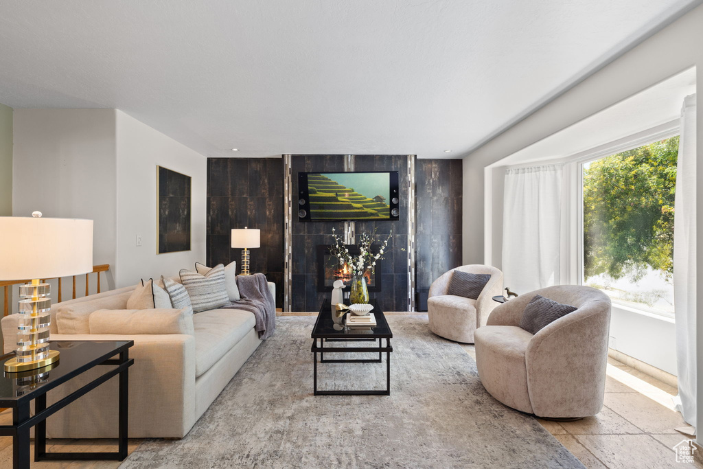 Living area featuring stone tile floors