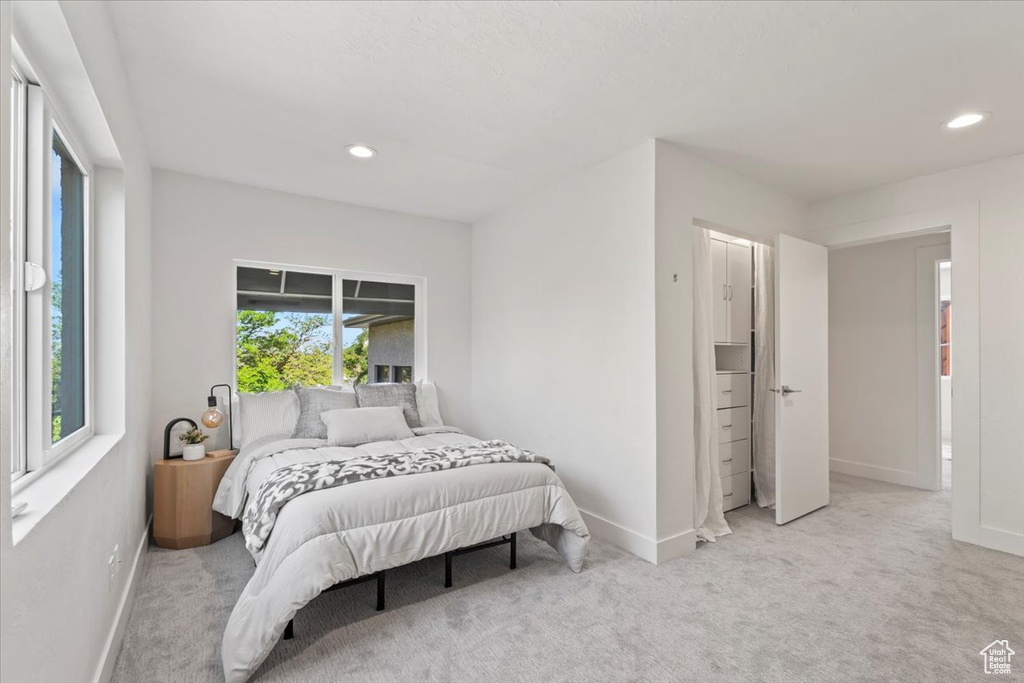 Bedroom with carpet flooring and recessed lighting