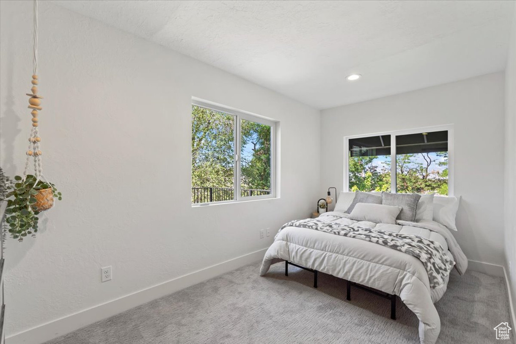 Bedroom featuring carpet flooring and recessed lighting