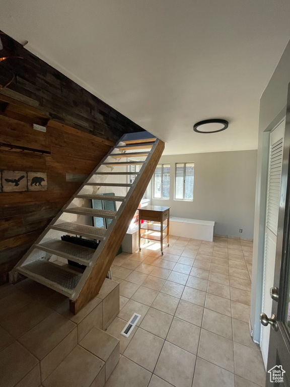Stairway featuring tile patterned flooring