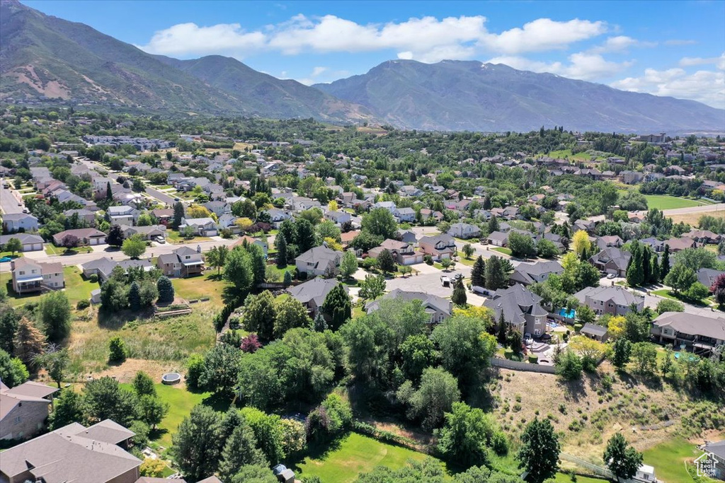 Aerial view of residential area with mountains