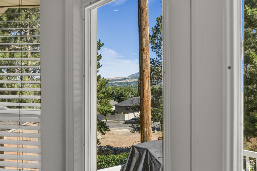 Doorway to outside with a mountain view
