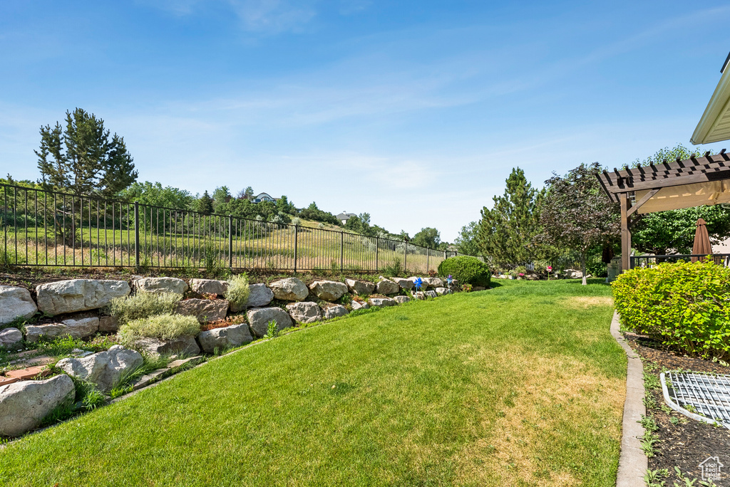 View of yard with a pergola