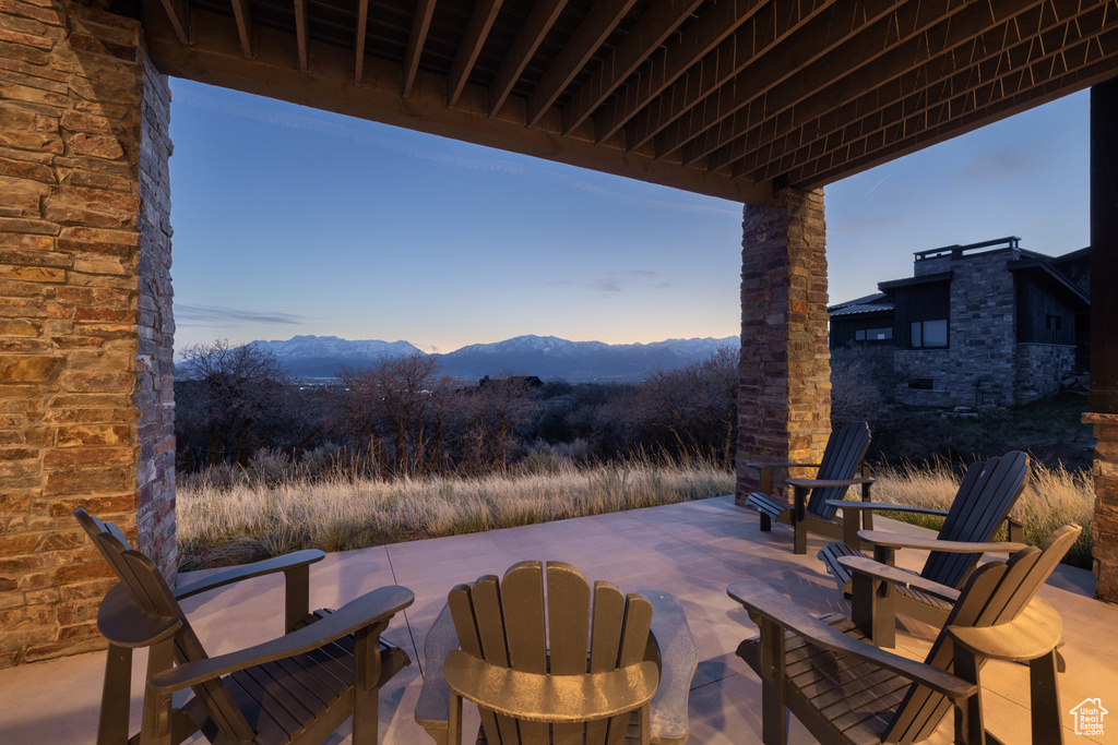 View of patio with a mountain view