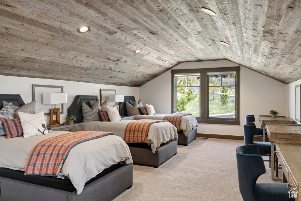 Bedroom featuring light colored carpet, vaulted ceiling, wooden ceiling, and recessed lighting