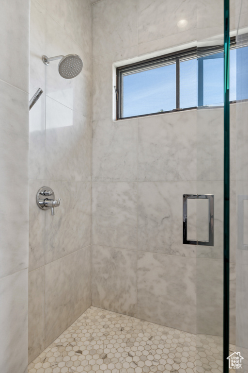 Bathroom featuring a shower stall