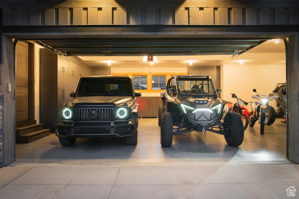 Garage featuring a garage door opener