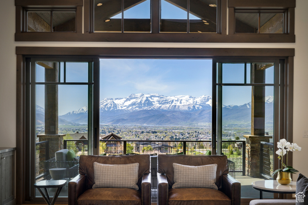 Sitting room featuring a mountain view and healthy amount of natural light