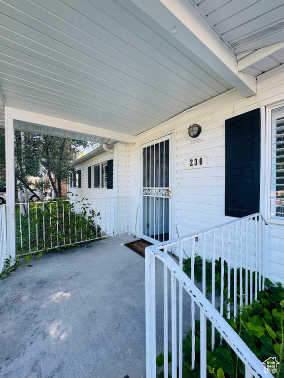 Entrance to property with covered porch